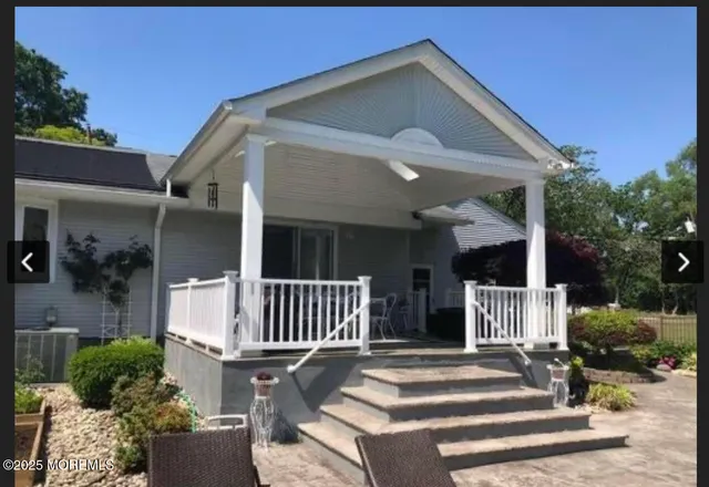 a front view of a house with a porch