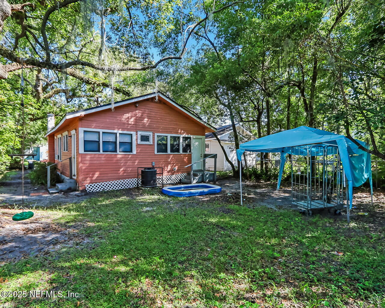 446 West 26th Street Jacksonville, FL 32206 - Photo 18 of 19 a view of a house with backyard and sitting area
