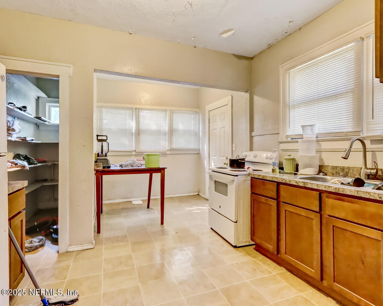 446 West 26th Street Jacksonville, FL 32206 - Photo 10 of 19 a kitchen with a sink cabinets and counter space