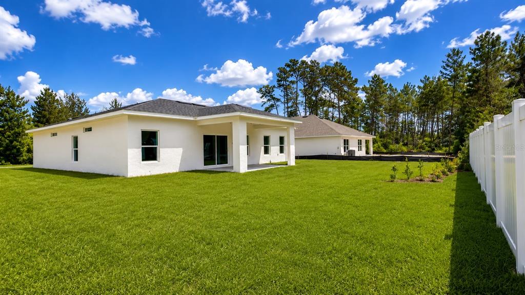 3620 Southwest 127th Lane Road Ocala, FL 34473 - Photo 4 of 23 a view of a house with backyard