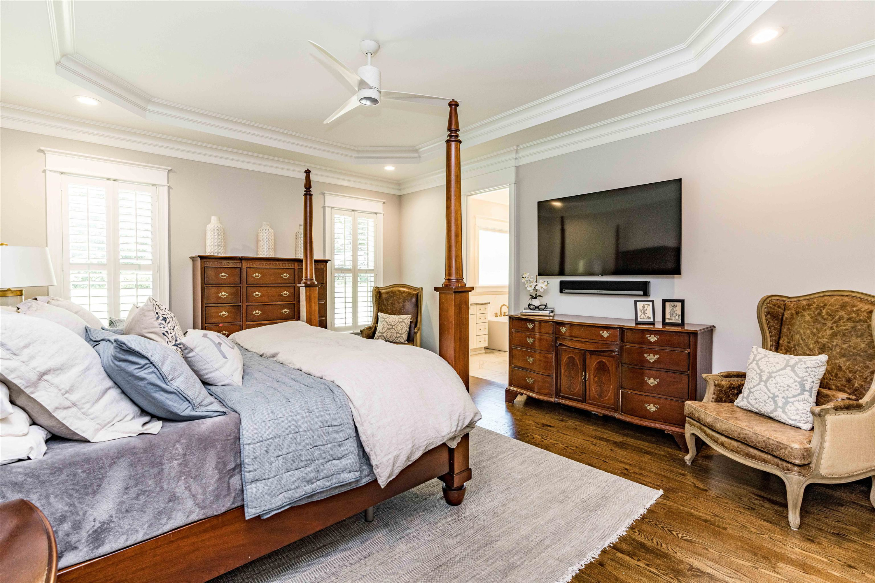 5405 Overlook Drive Raleigh, NC 27609 - Photo 29 of 57 a bedroom with a bed and a flat screen television
