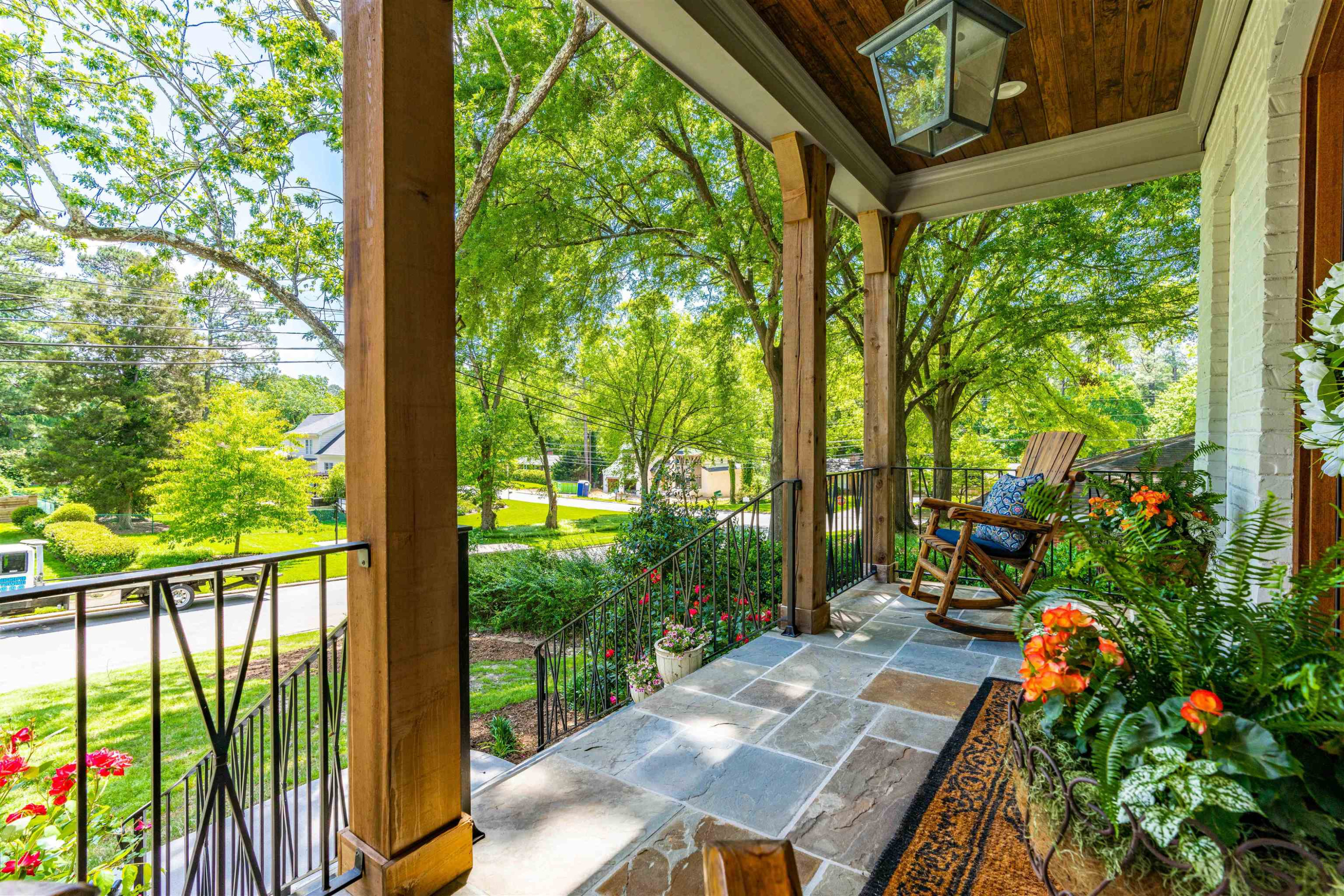 5405 Overlook Drive Raleigh, NC 27609 - Photo 5 of 57 a wooden bench sitting in front of a building