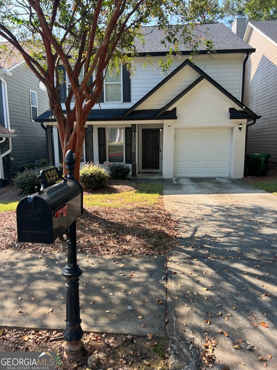 1325 Gates Circle Southeast Atlanta, GA 30316 - Photo 2 of 14 a front view of a house with yard