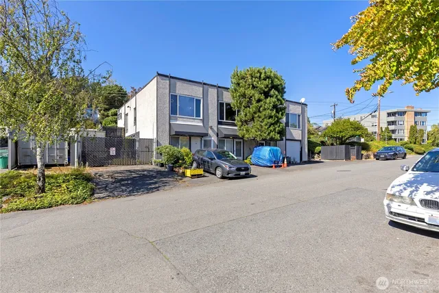 a view of a street with cars