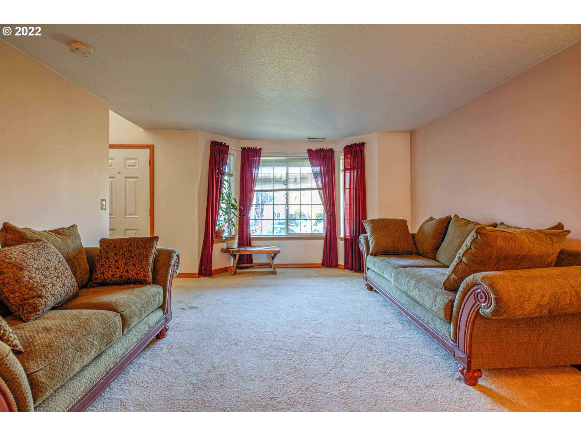 1254 Crystal Lane Lafayette, OR 97127 - Photo 12 of 25 a living room with furniture and a flat screen tv