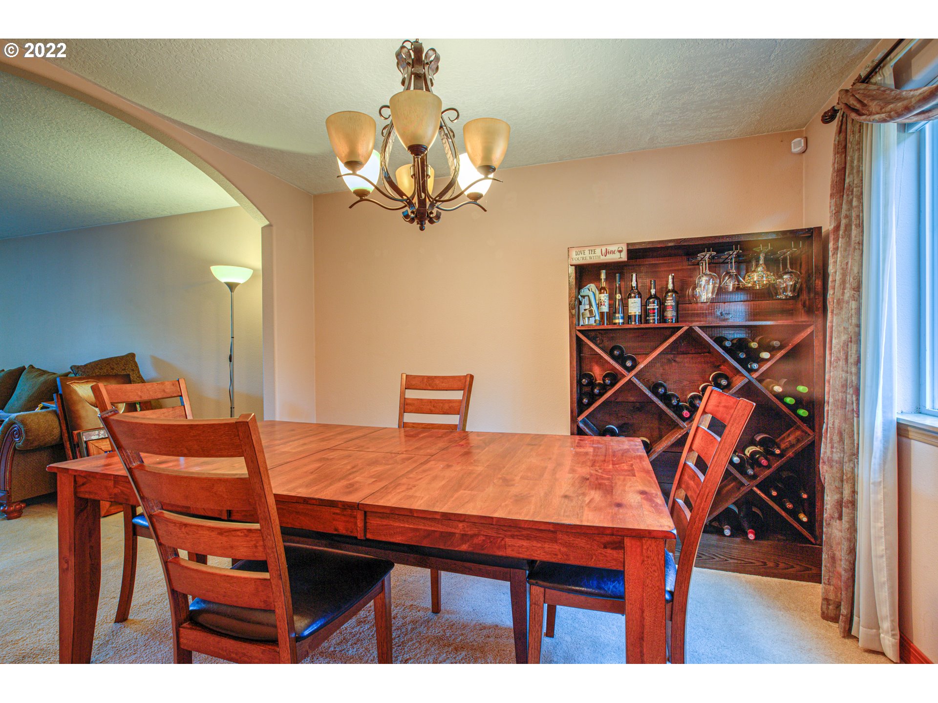 1254 Crystal Lane Lafayette, OR 97127 - Photo 14 of 25 a view of a dining room with furniture and chandelier