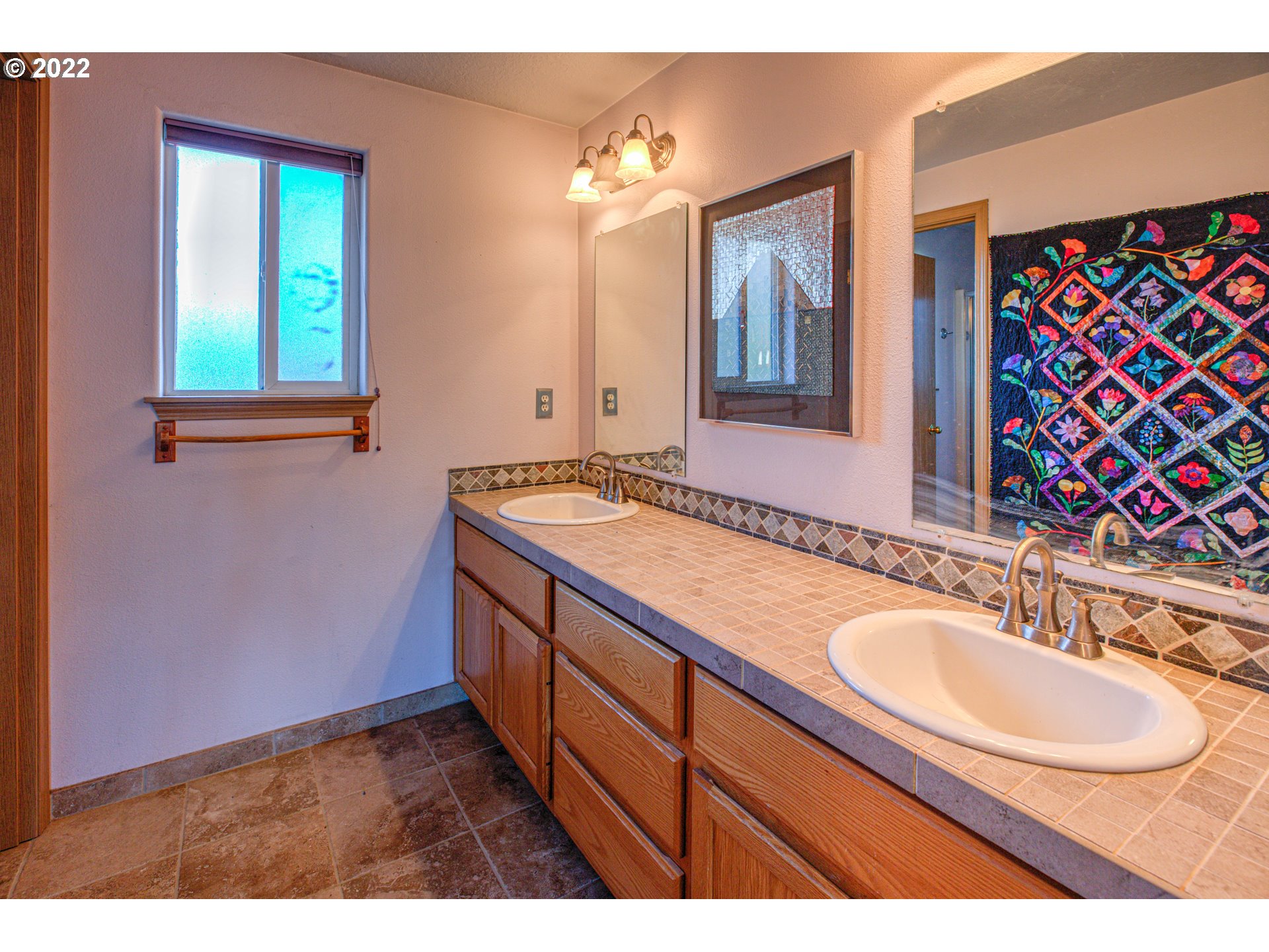 1254 Crystal Lane Lafayette, OR 97127 - Photo 22 of 25 a bathroom with a sink and a mirror
