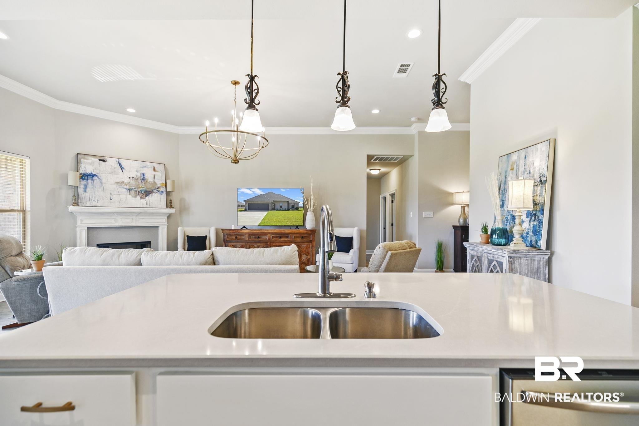 10140 Chipper Lane Foley, AL 36535 - Photo 20 of 72 Kitchen featuring sink, hanging light fixtures, dishwasher, and an island with sink