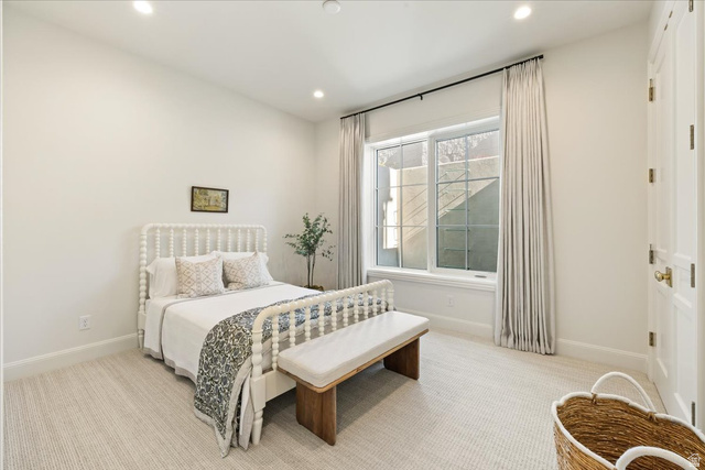 478 South Maple Lakes Drive Mapleton, UT 84664 - Photo 38 of 51 Recessed lighting illuminates a space featuring a large window with white casing and light-toned drapery