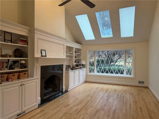 a view of livingroom and hardwood floor