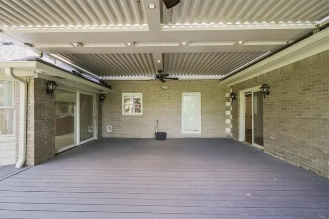 a view of a livingroom with a large window