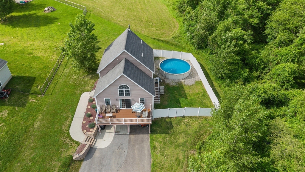 96 Town Farm Road Warren, MA 01083 - Photo 1 of 39 a view of a house with a yard