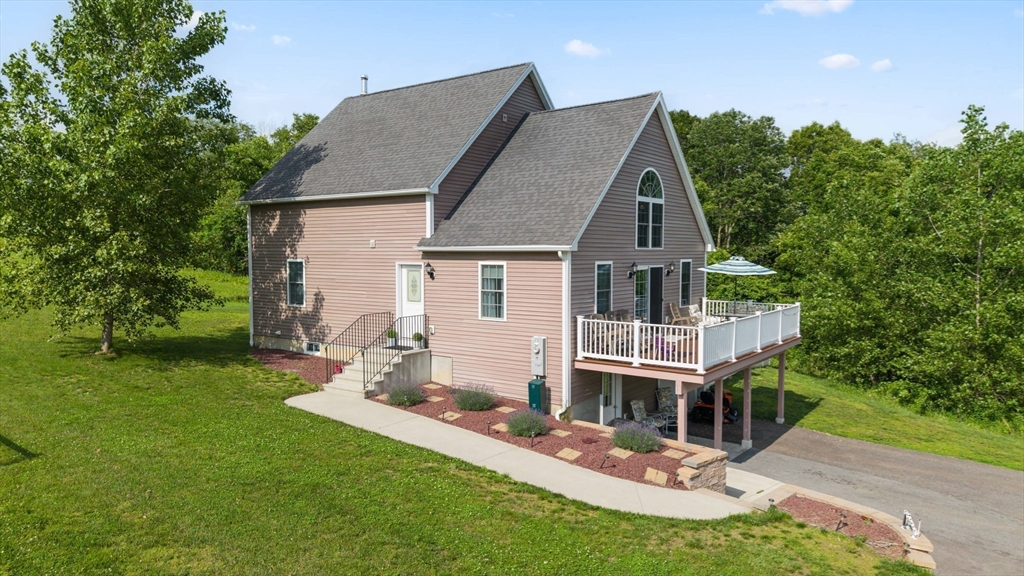 96 Town Farm Road Warren, MA 01083 - Photo 3 of 39 front view of house with a yard