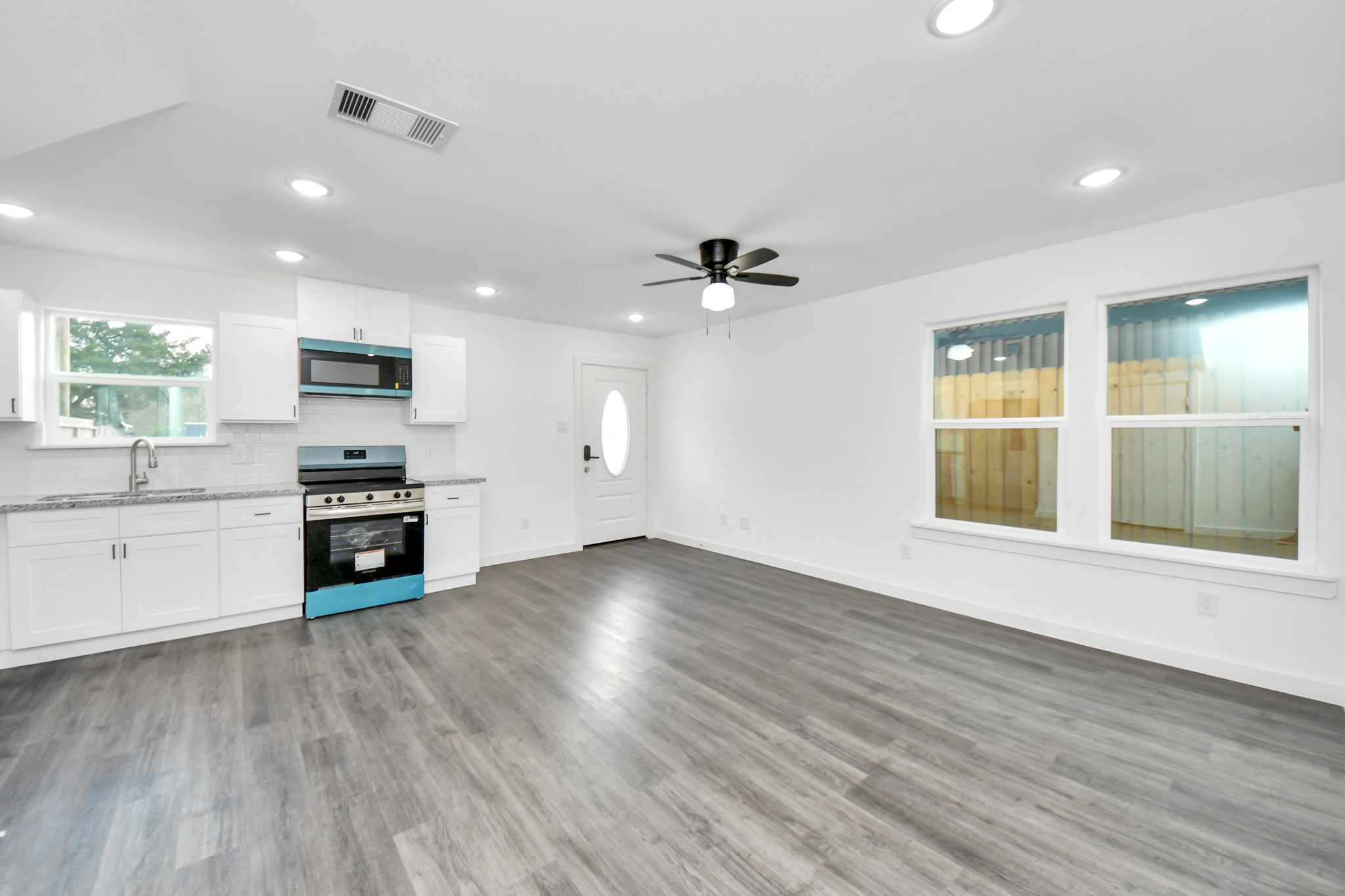 2310 Wavell Street, Unit B Houston, TX 77088 - Photo 12 of 31 a view of kitchen with sink and wooden floor