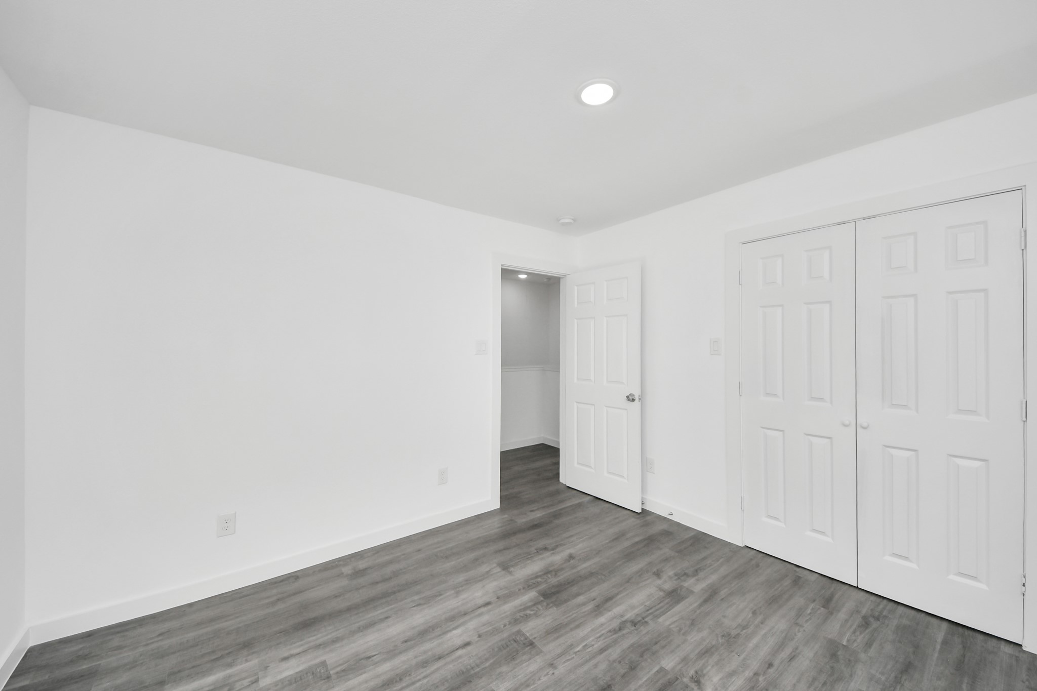 2310 Wavell Street, Unit B Houston, TX 77088 - Photo 24 of 31 a view of an empty room with wooden floor