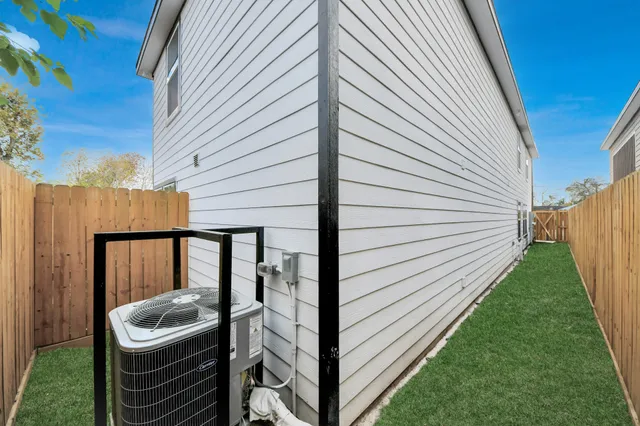 a view of a back yard from a balcony