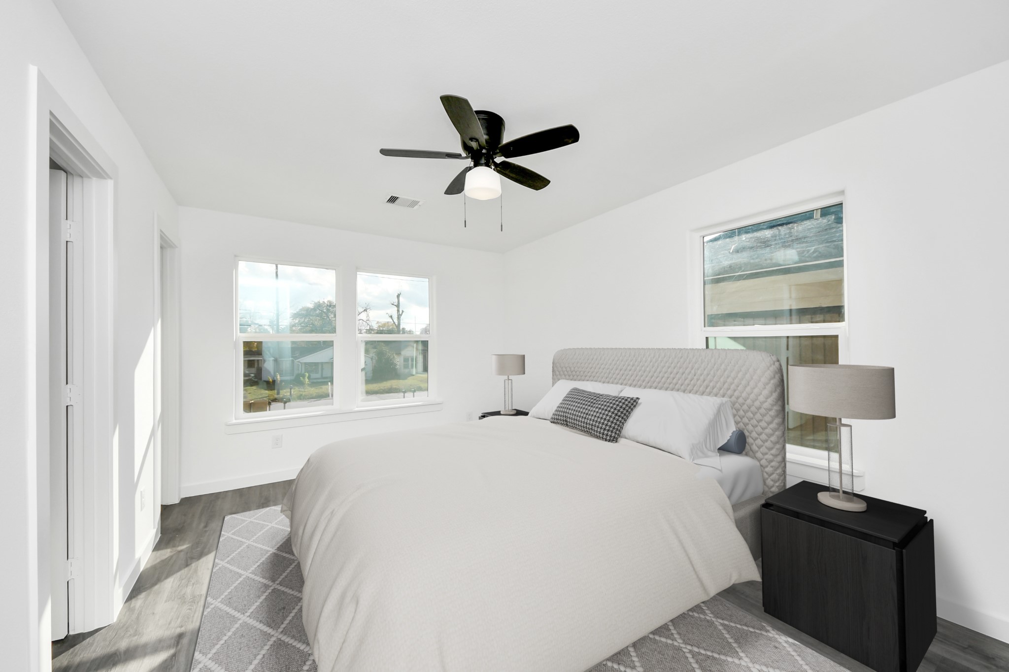 2310 Wavell Street, Unit B Houston, TX 77088 - Photo 7 of 31 a bedroom with a bed and window