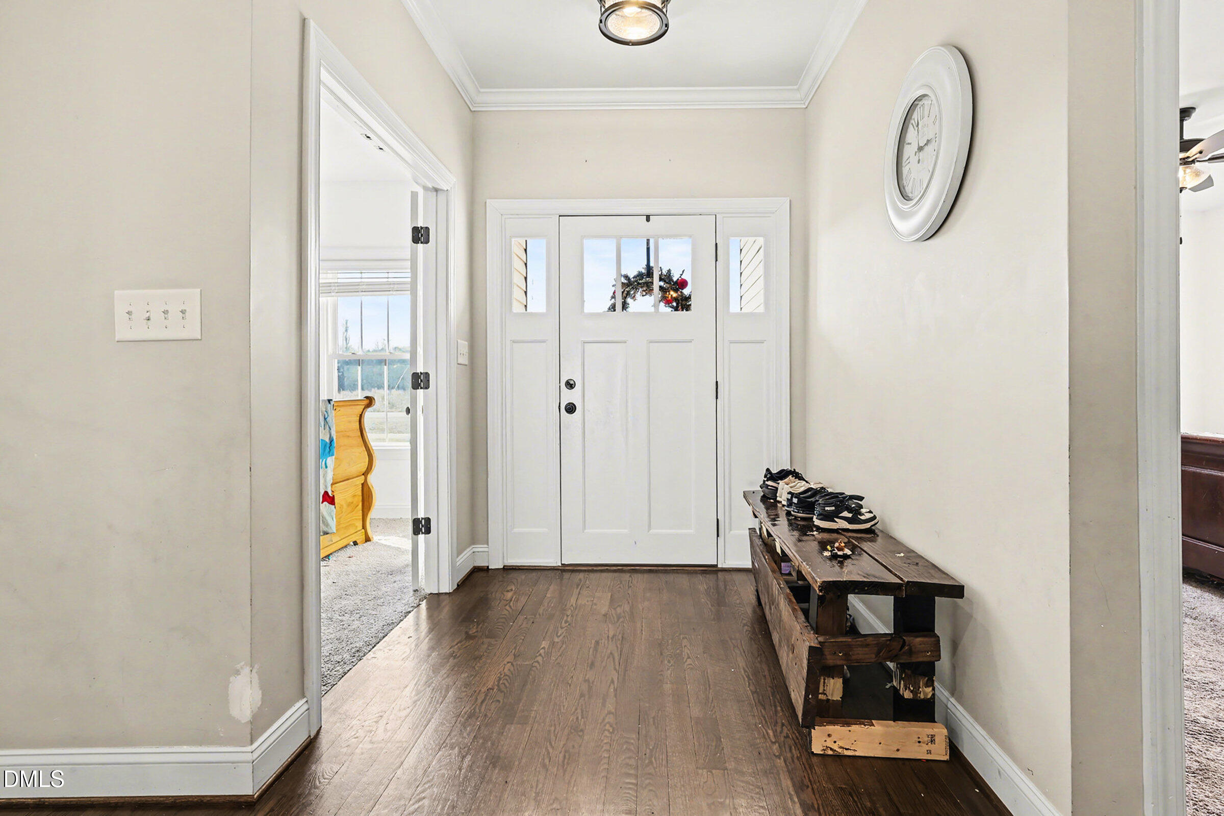5117 Joe Ellen Road Battleboro, NC 27809 - Photo 4 of 29 a view of a hallway with wooden floor and closet