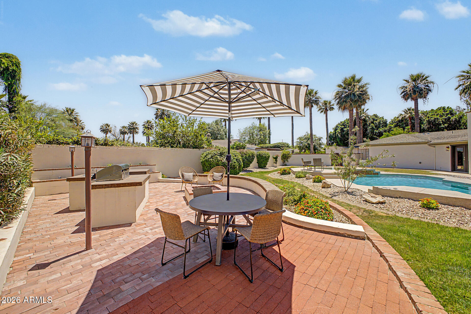 1625 Palmcroft Way Southwest Phoenix, AZ 85007 - Photo 55 of 64 a view of a swimming pool with a patio