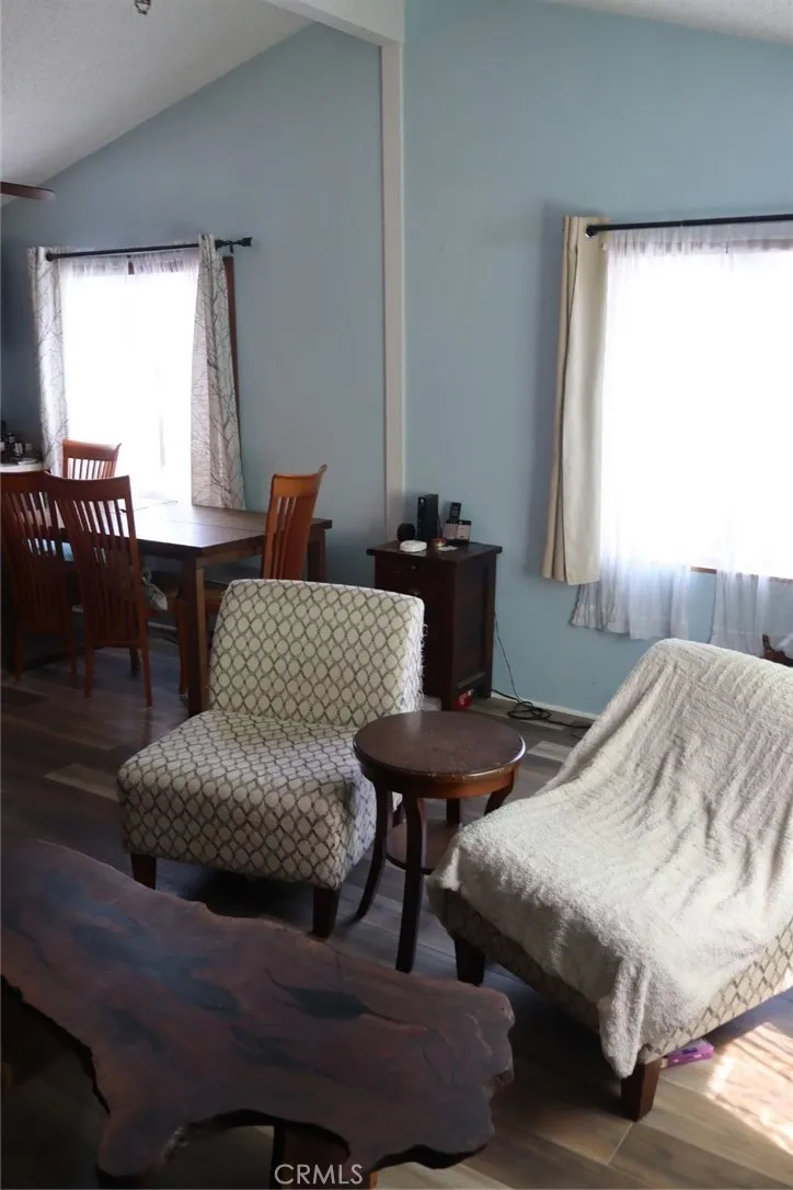 15325 Orange, Unit F16 Paramount, CA 90723 - Photo 10 of 25 a bedroom with a bed and window