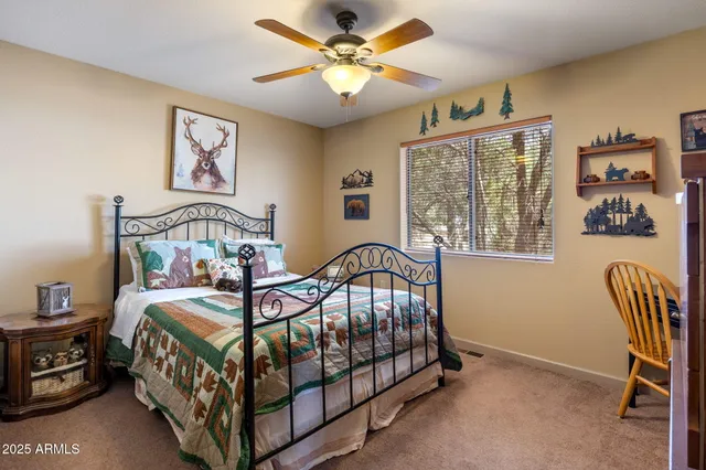 a view of a dining room with furniture and window