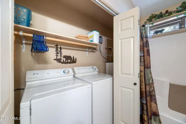 a bedroom with a bed and a table in it