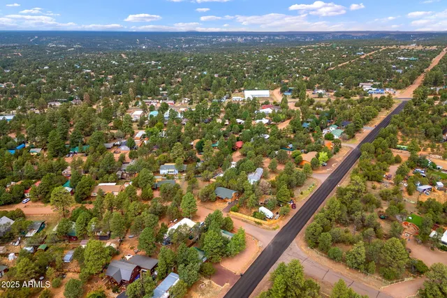 an aerial view of residential house with outdoor space