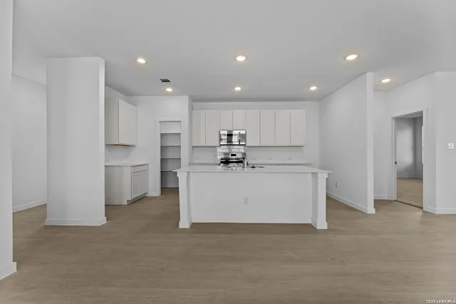 an empty room with windows