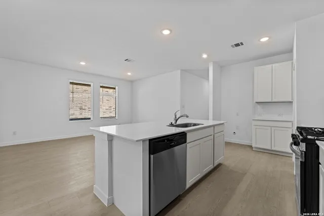 an empty room with windows