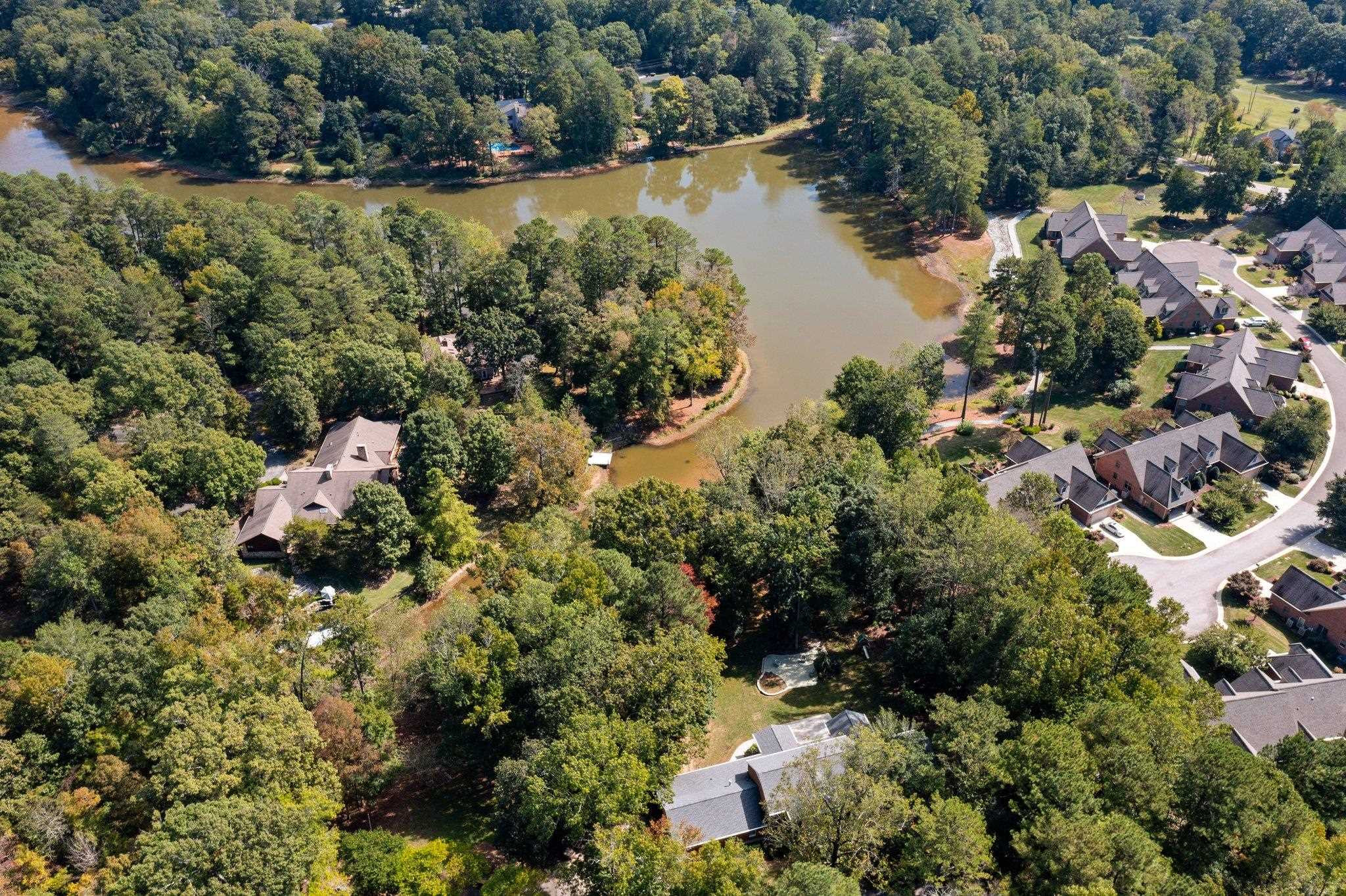 5308 Craig Road Durham, NC 27712 - Photo 14 of 46 a view of a lake with a house