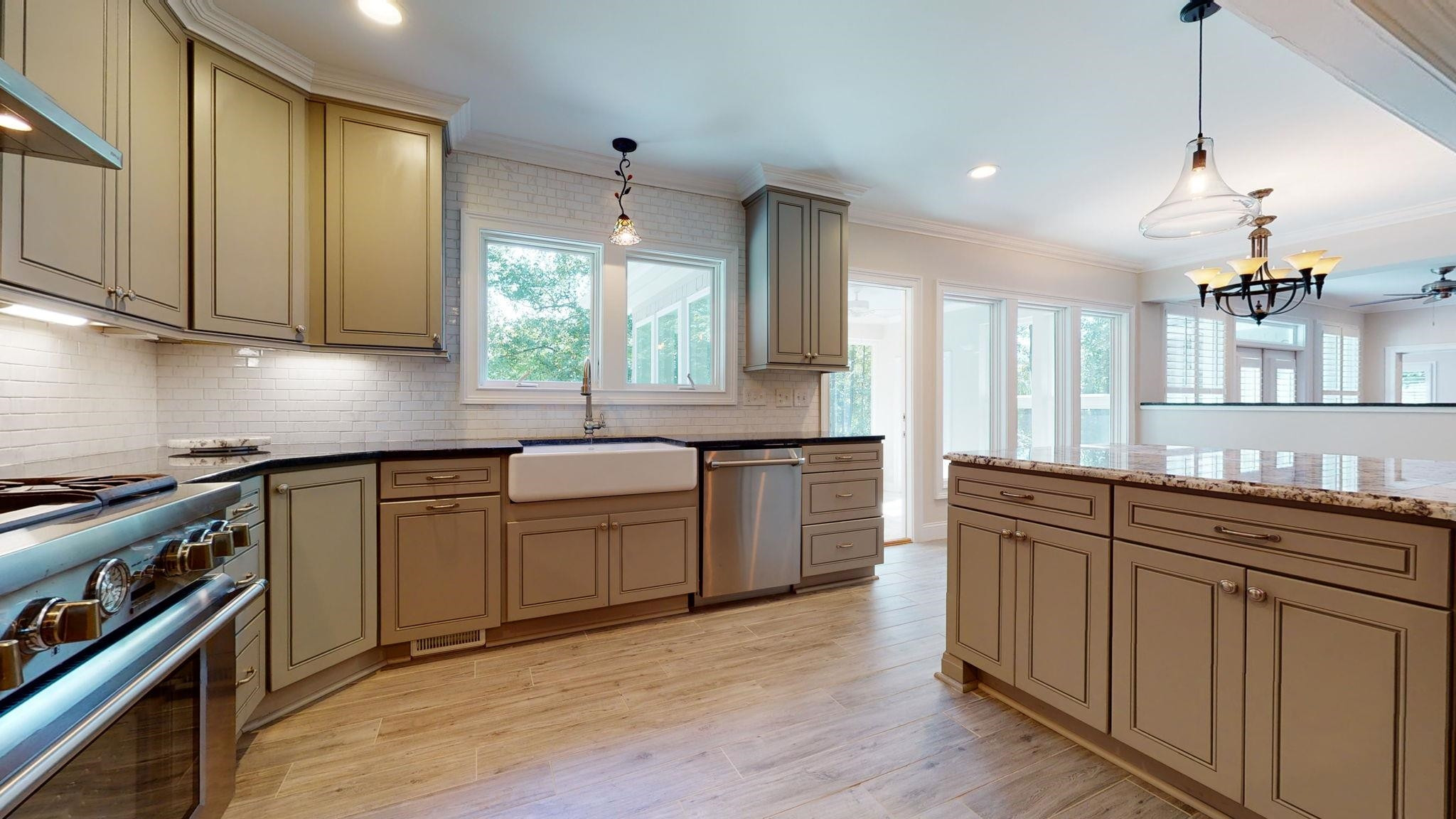 5308 Craig Road Durham, NC 27712 - Photo 19 of 46 a kitchen with sink cabinets and window
