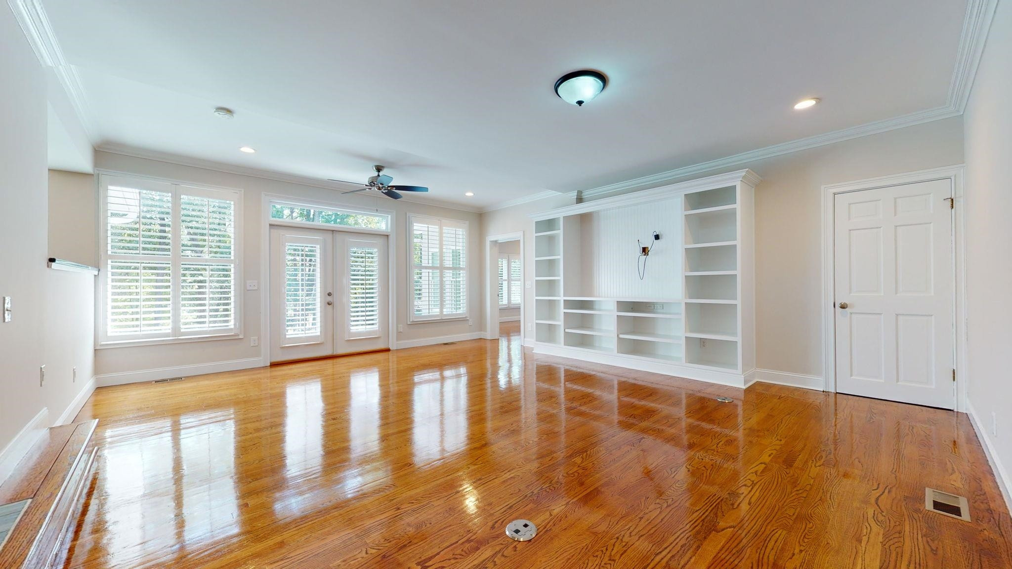 5308 Craig Road Durham, NC 27712 - Photo 23 of 46 a view of an empty room with wooden floor and a window