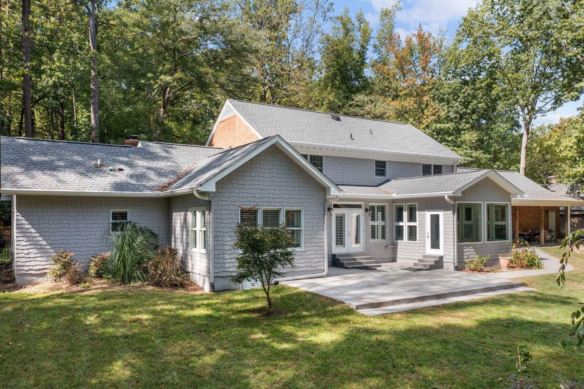 5308 Craig Road Durham, NC 27712 - Photo 29 of 46 a front view of a house with a yard outdoor seating and garage