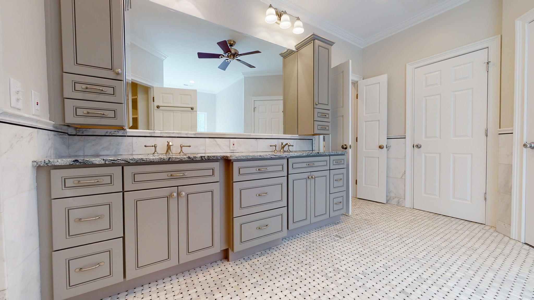 5308 Craig Road Durham, NC 27712 - Photo 33 of 46 a bathroom with a granite countertop sink and a mirror