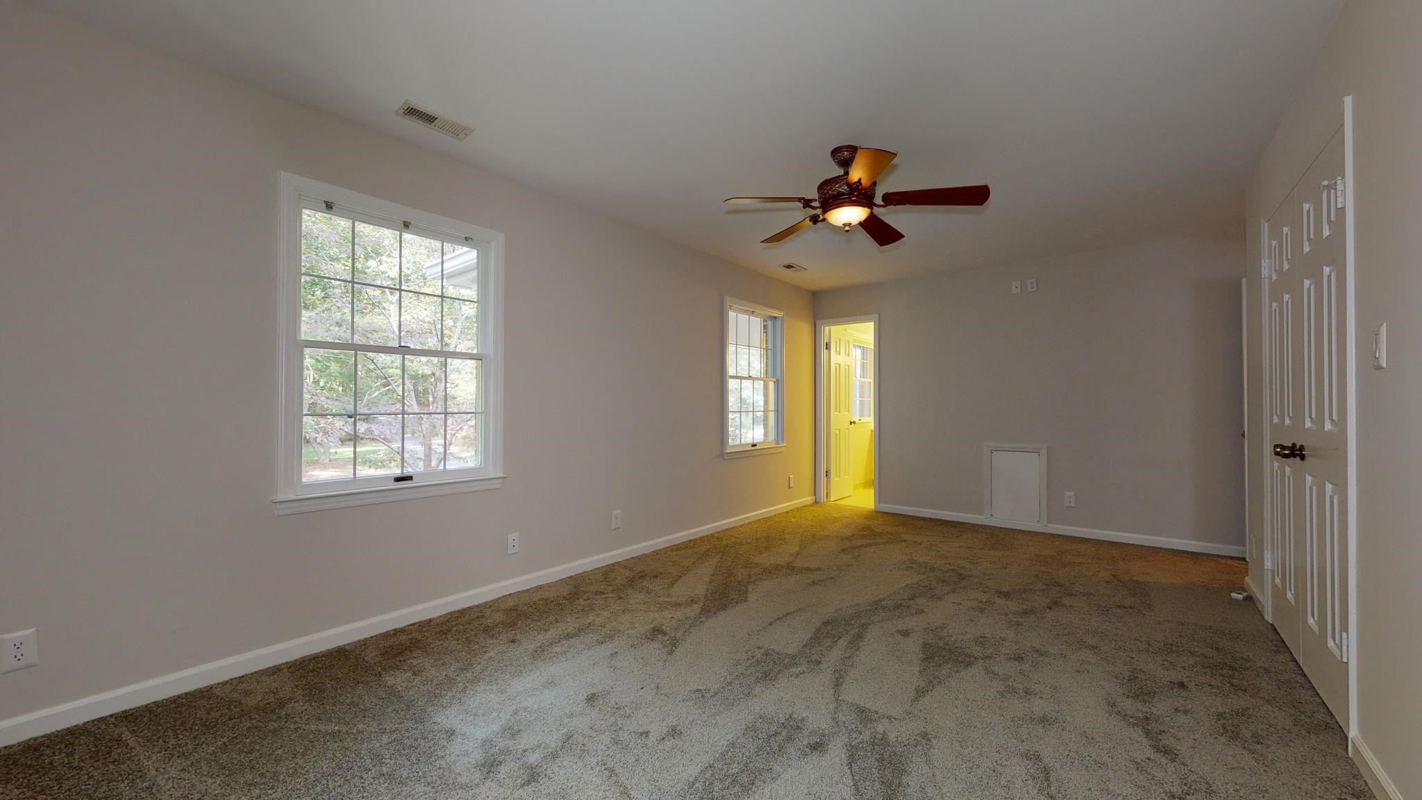 5308 Craig Road Durham, NC 27712 - Photo 39 of 46 a view of an empty room with a window