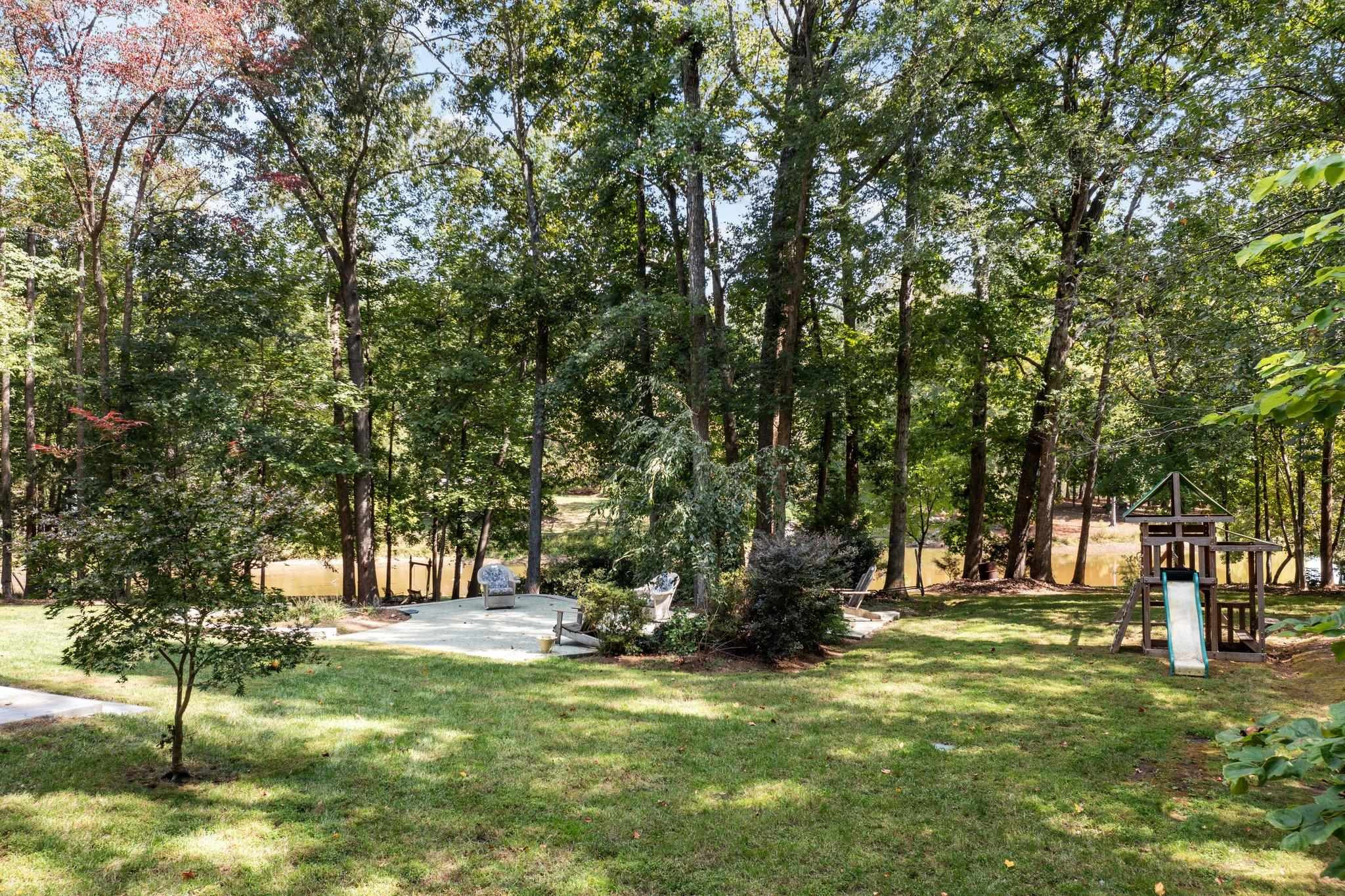 5308 Craig Road Durham, NC 27712 - Photo 10 of 46 a huge green field with lots of trees