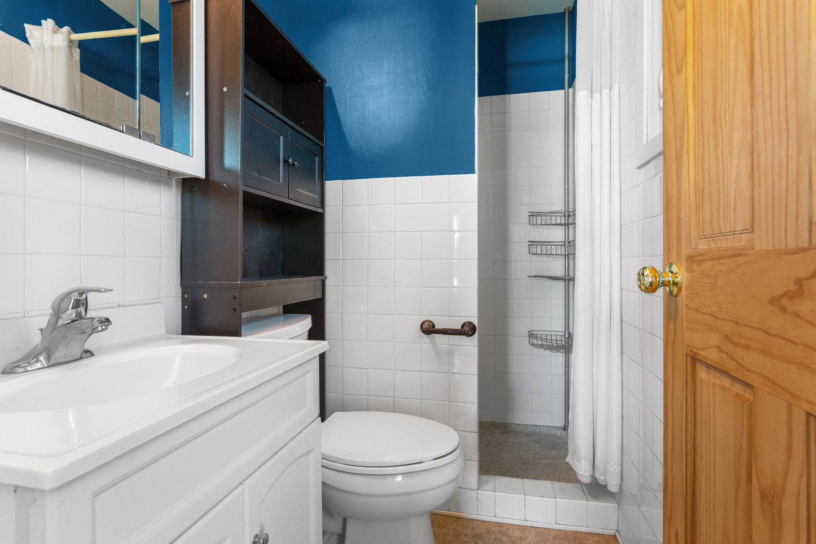 1554 South Pointe Drive Rantoul, IL 61866 - Photo 26 of 39 a bathroom with a sink toilet and shower