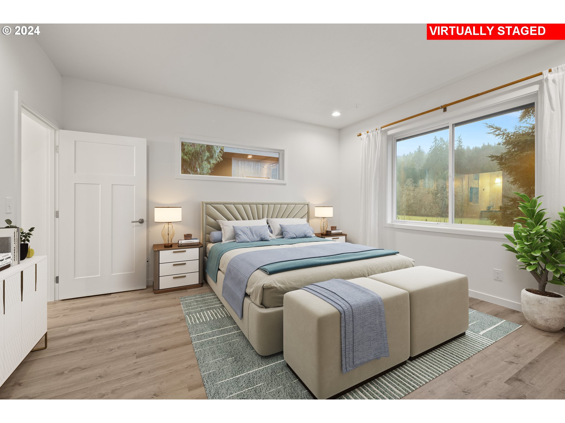 23300 Northwest Bravo Road Buxton, OR 97109 - Photo 11 of 47 a bedroom with a large bed and a potted plant