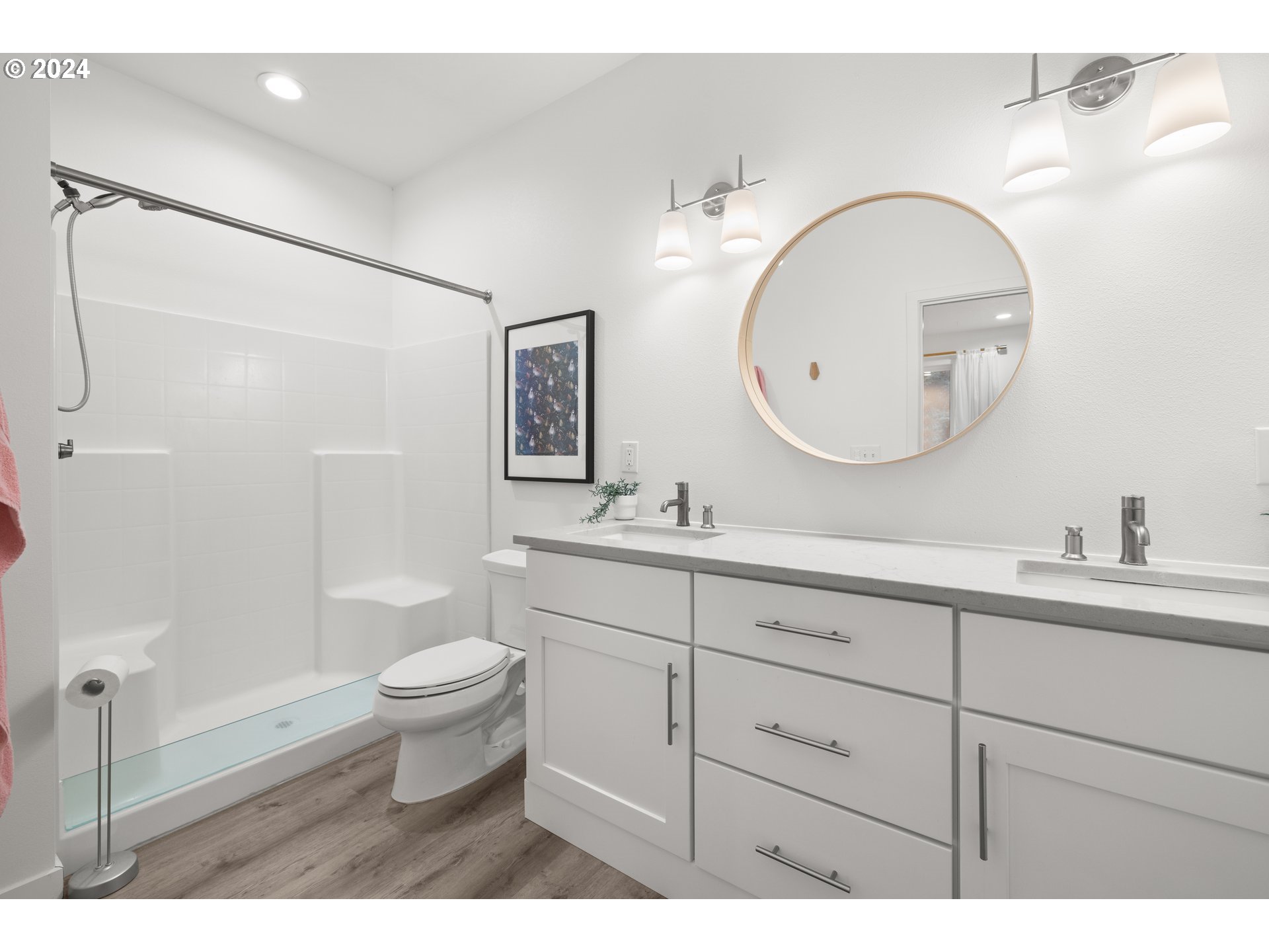 23300 Northwest Bravo Road Buxton, OR 97109 - Photo 14 of 47 a bathroom with a double vanity sink toilet and a mirror