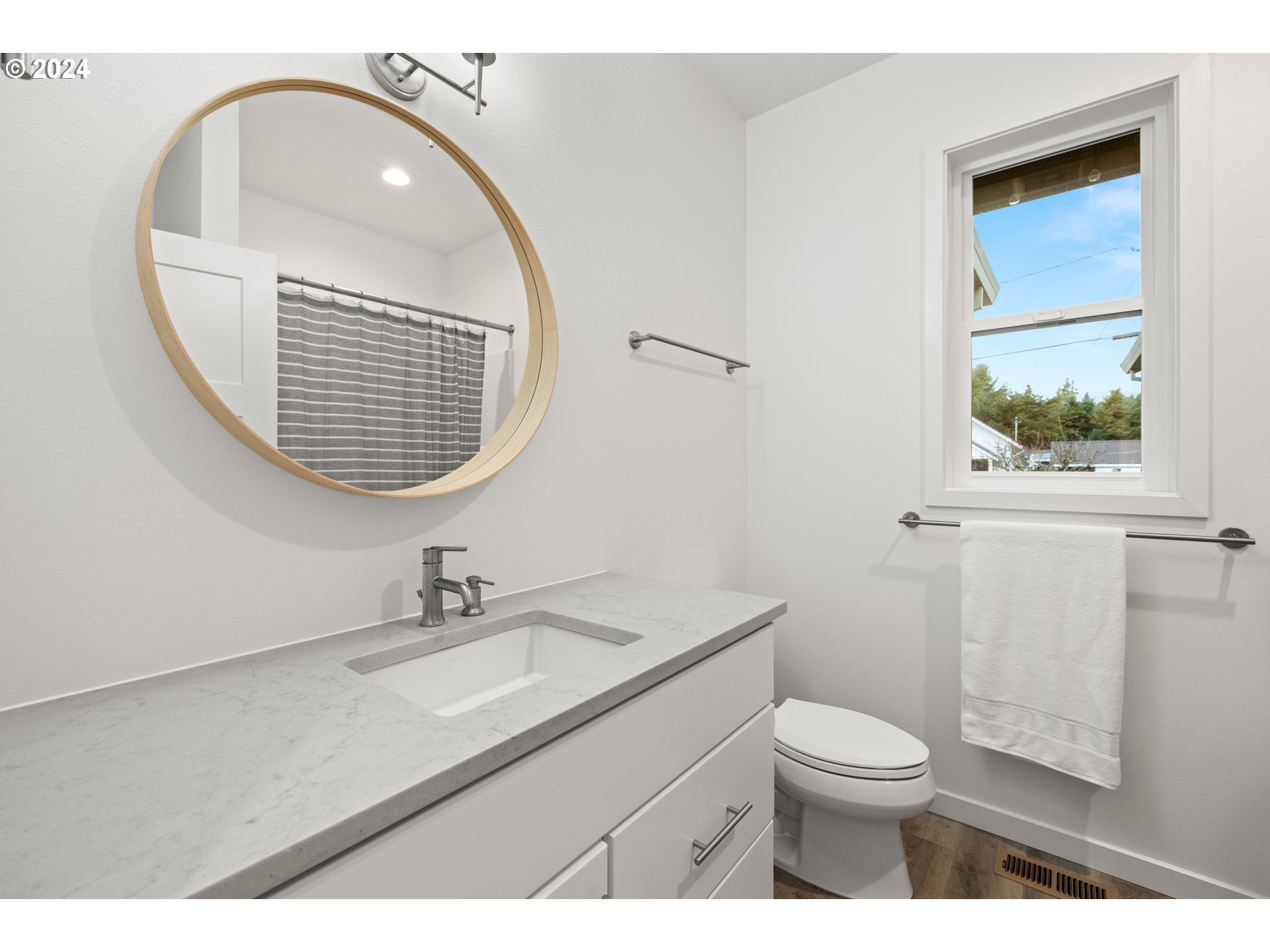 23300 Northwest Bravo Road Buxton, OR 97109 - Photo 17 of 47 a bathroom with a sink a toilet and a mirror