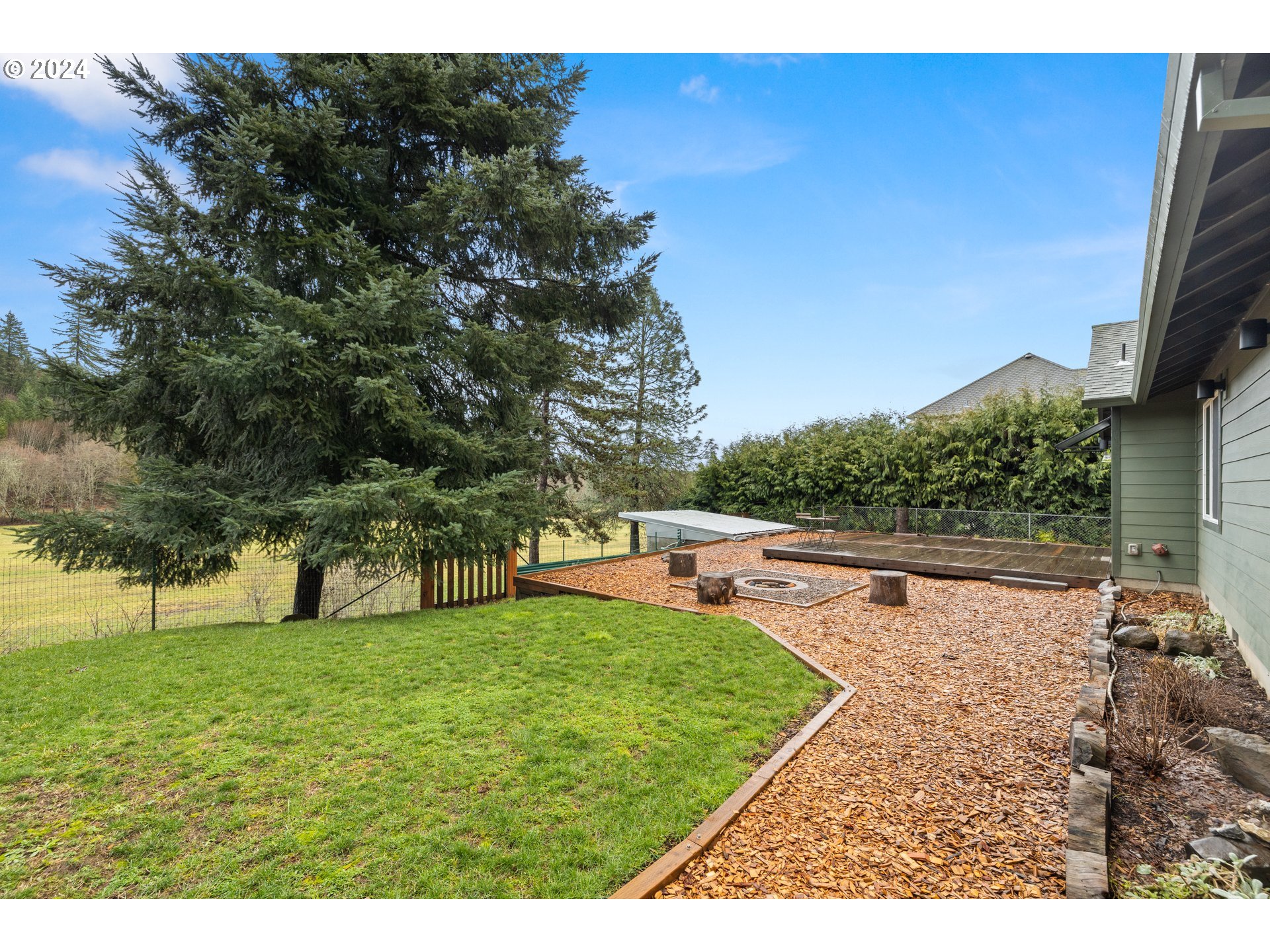 23300 Northwest Bravo Road Buxton, OR 97109 - Photo 2 of 47 a view of yard with swimming pool and green space
