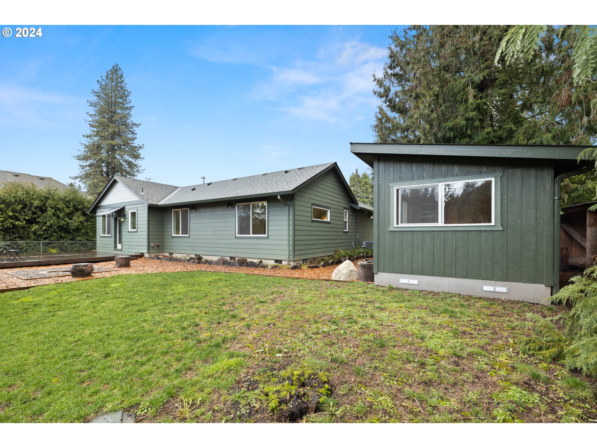 23300 Northwest Bravo Road Buxton, OR 97109 - Photo 28 of 47 a view of a house with a yard