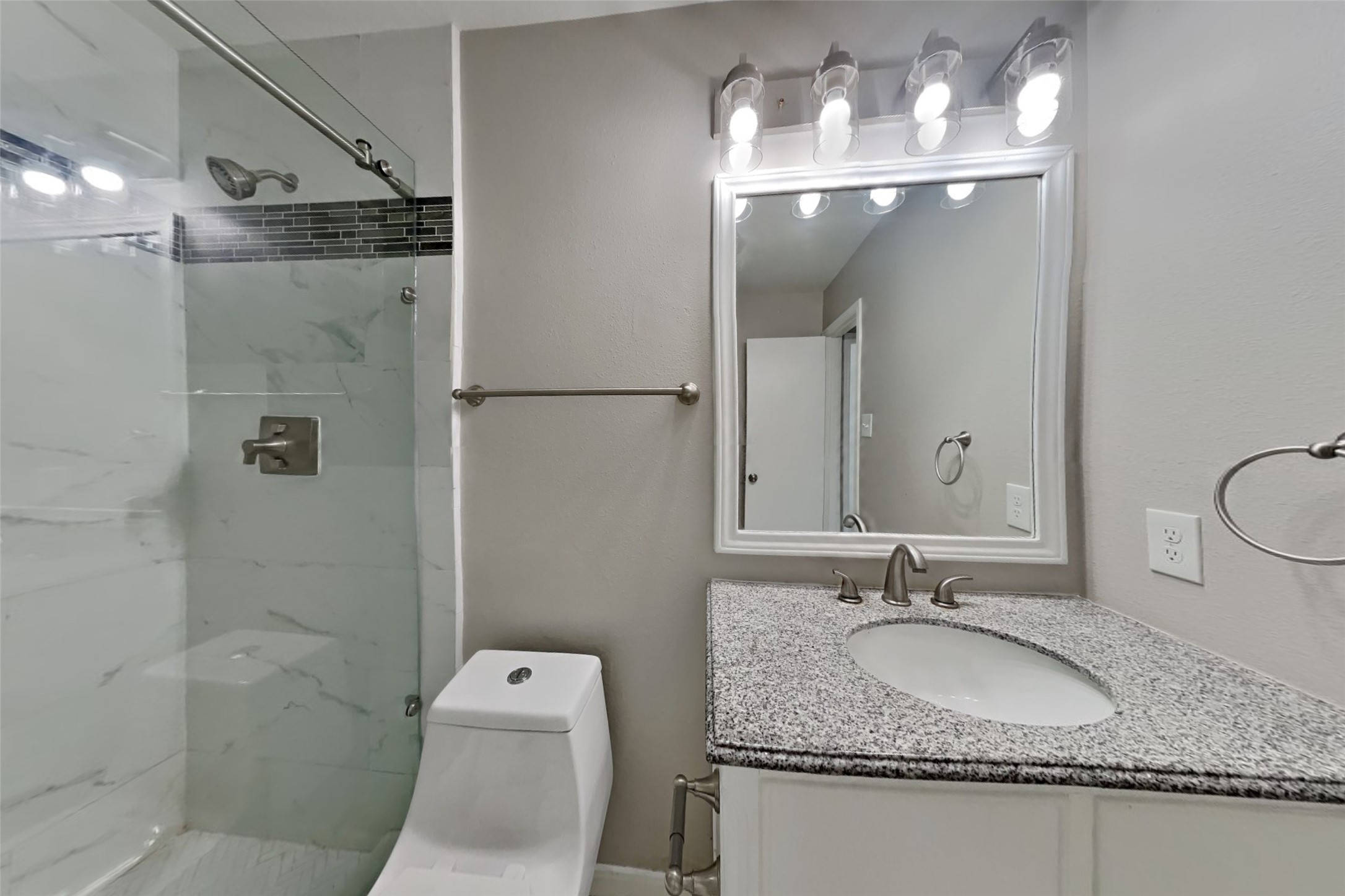 2506 Buckminster Drive Spring, TX 77386 - Photo 18 of 22 a bathroom with a granite countertop sink toilet and shower