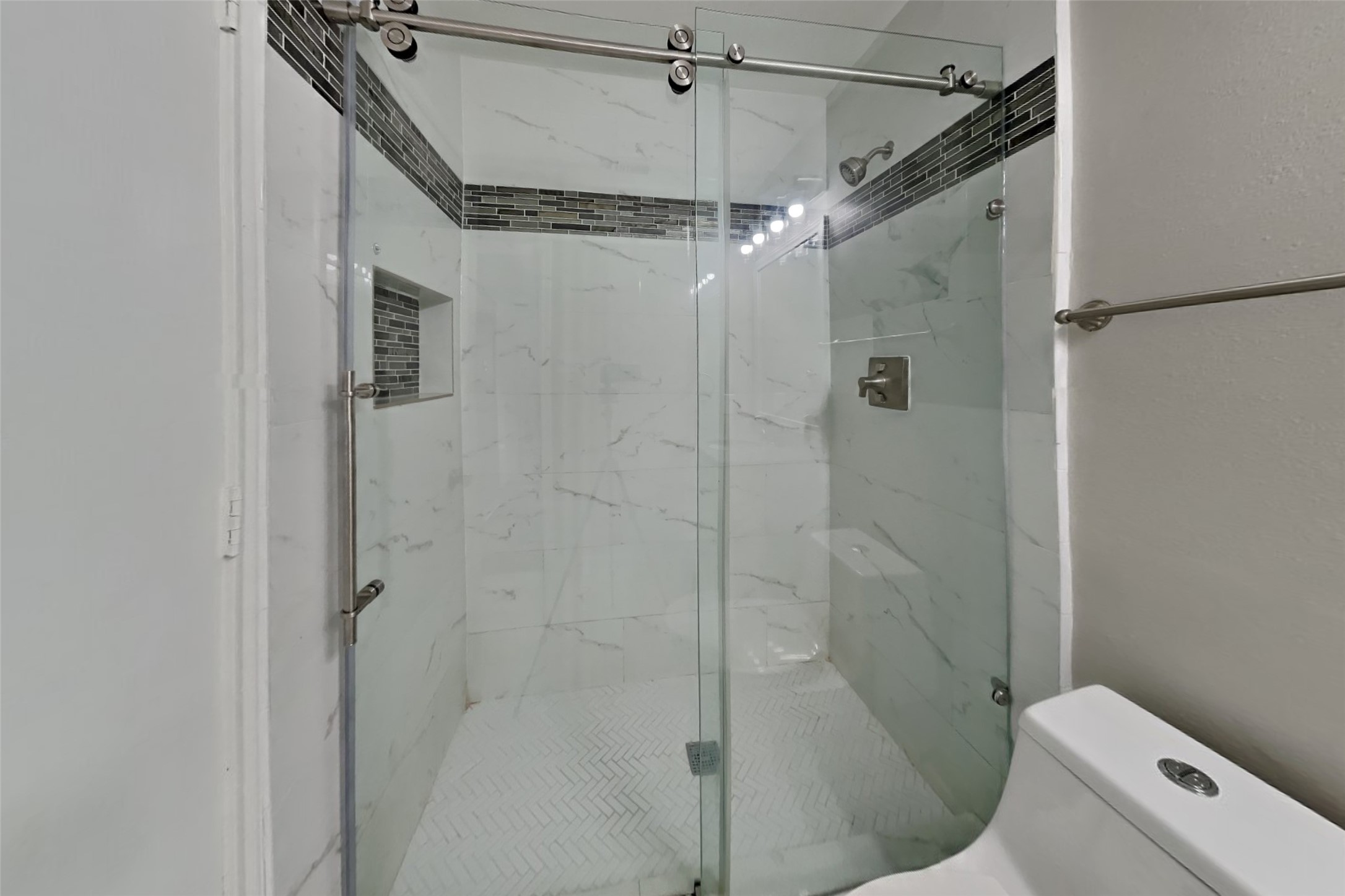 2506 Buckminster Drive Spring, TX 77386 - Photo 19 of 22 a bathroom with a shower and toilet