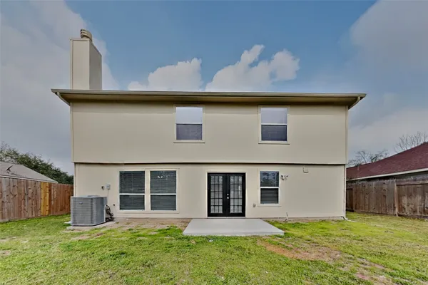 a house that has a big yard in front of it