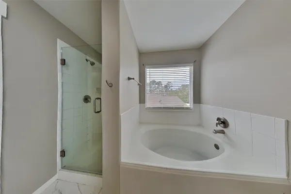a bathroom with a bathtub