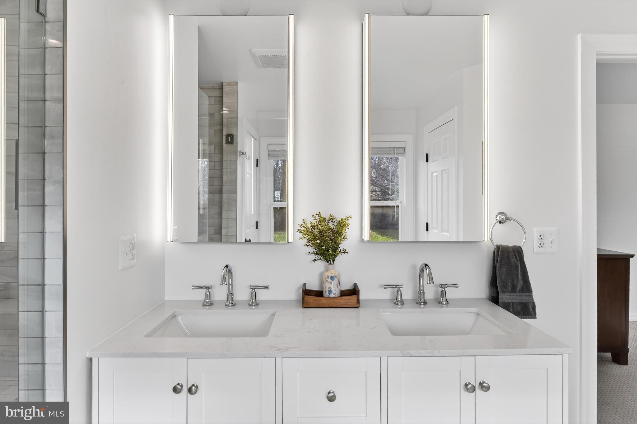 1507 Manor View Road Davidsonville, MD 21035 - Photo 14 of 45 a bathroom with double sink and a mirror