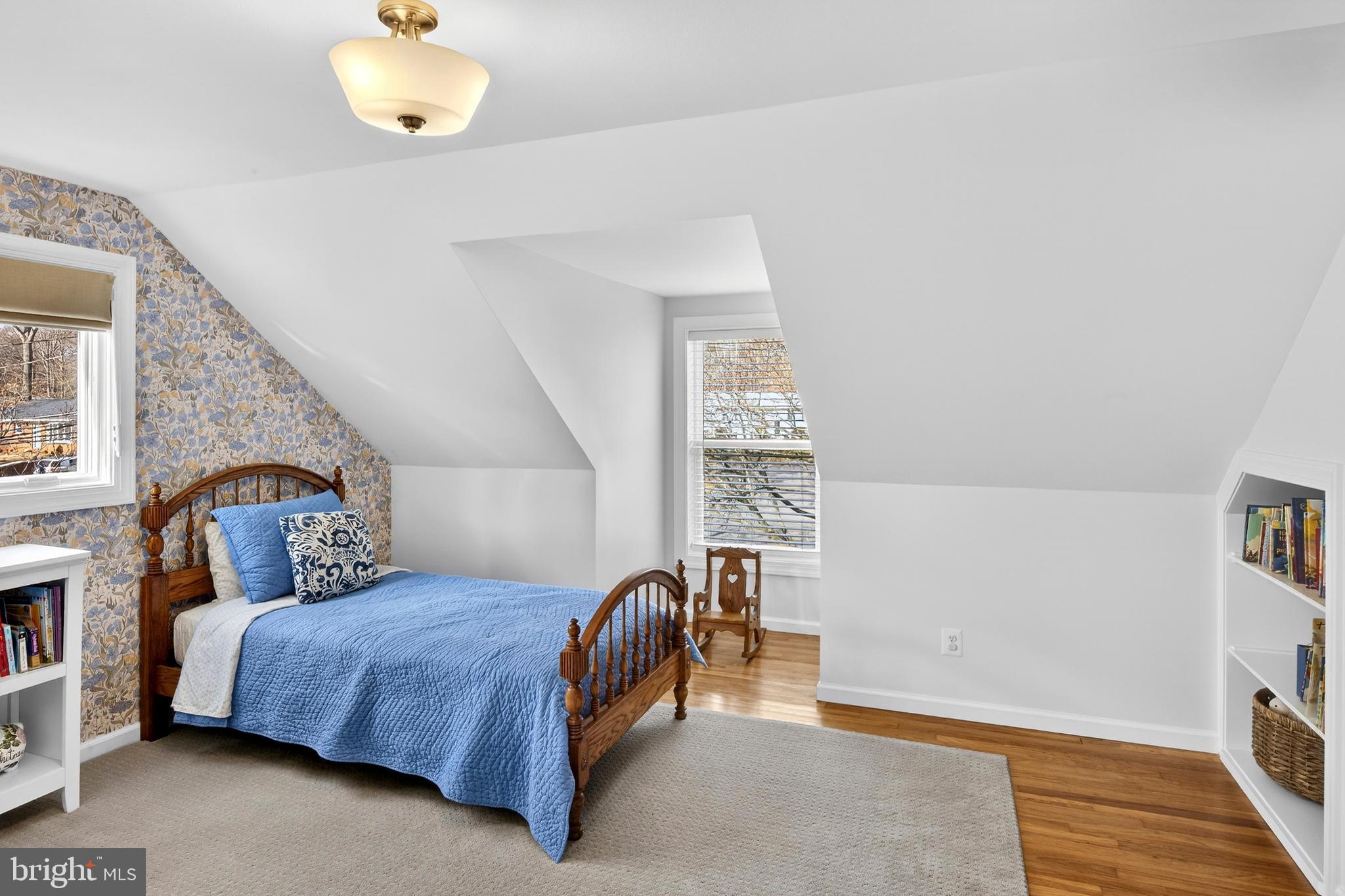 1507 Manor View Road Davidsonville, MD 21035 - Photo 21 of 45 a bedroom with a large bed and a chandelier