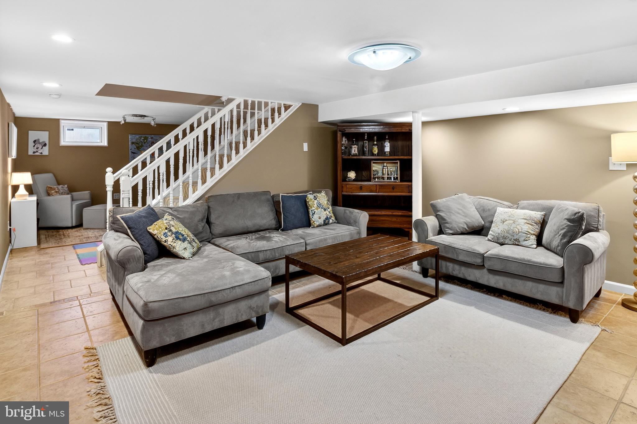 1507 Manor View Road Davidsonville, MD 21035 - Photo 30 of 45 a living room with furniture and wooden floor