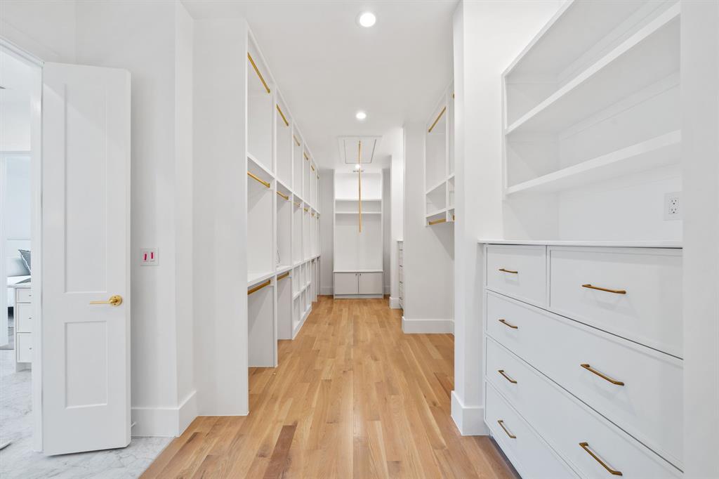 6437 Churchill Way Dallas, TX 75230 - Photo 29 of 38 a view of hallway with wooden floor
